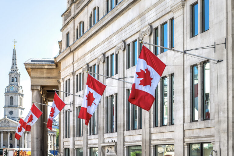 Canadian flags on federal building for immigration context