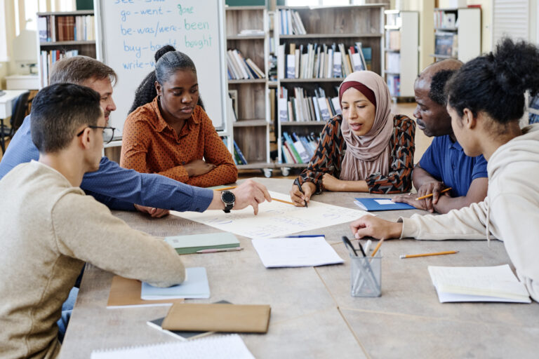 International students discussing OINP application strategy