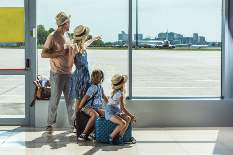 Newcomer family at airport ready for Canadian immigration journey