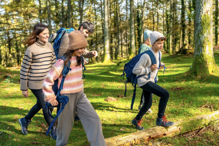 Family enjoying nature walk in Canada after immigration approval