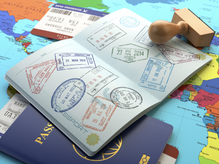 Stamped passport with visa documents and travel proof