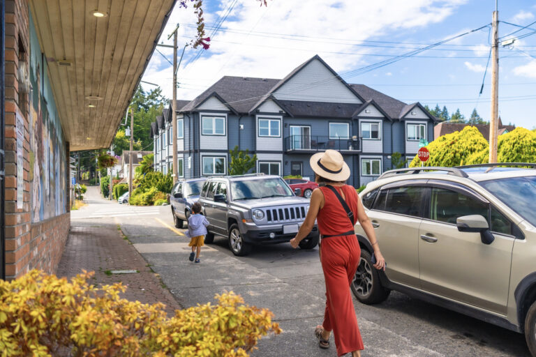 Multicultural family exploring Canadian neighbourhood