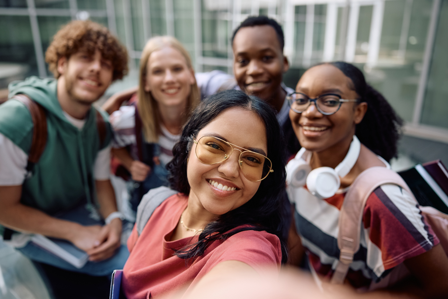 Young woman reading book in library
