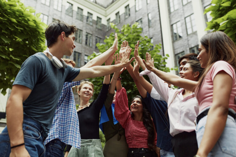 Diverse students celebrate on campus