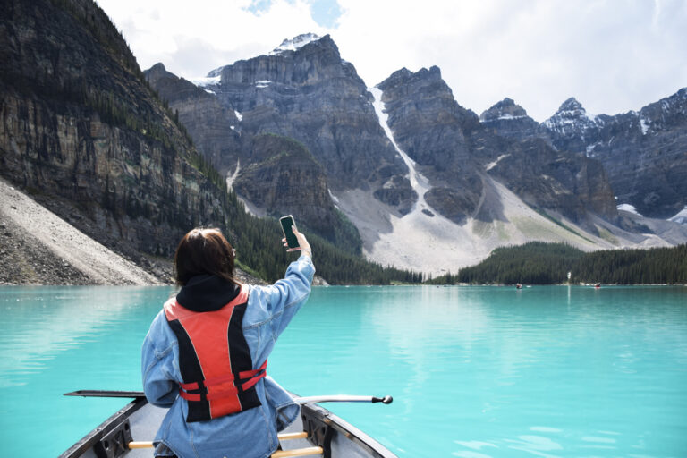 Person canoeing on Moraine Lake, Canada