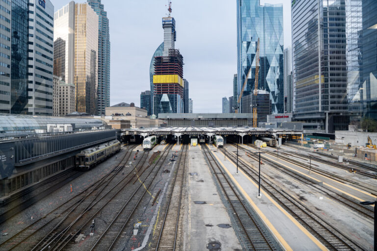 Toronto train station with skyscrapers