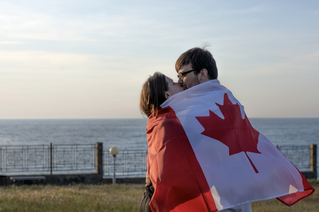 Canadian cityscape with diverse crowd