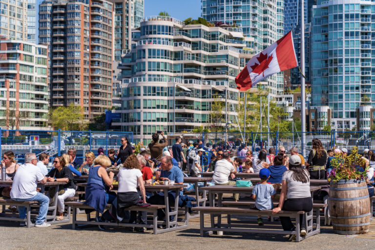 Canadian cityscape with diverse crowd