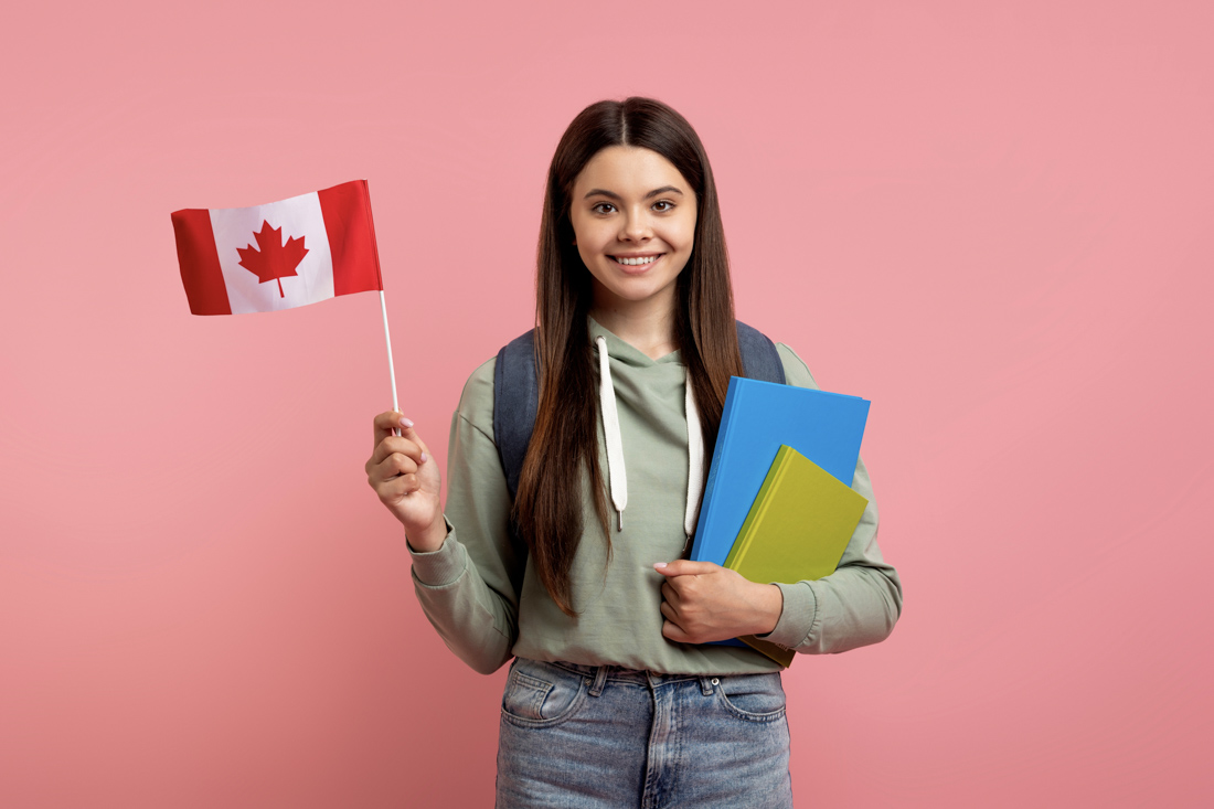 Canadian consultant in office with flag