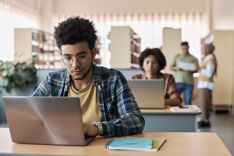 Student researching Canadian visa online